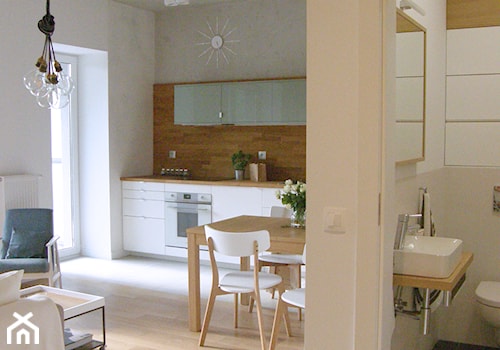 Poloneza 36m2 - Mały biały salon z kuchnią z jadalnią, styl nowoczesny - zdjęcie od ESTU architektura wnętrz