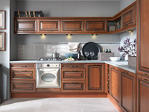 kuchnie - Średnia otwarta z salonem szara z zabudowaną lodówką kuchnia w kształcie litery l - zdjęcie od Black Red White