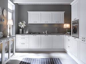 kuchnie - Średnia zamknięta szara z zabudowaną lodówką z podblatowym zlewozmywakiem kuchnia w kształcie litery l z kompozytem na ścianie nad blatem kuchennym - zdjęcie od Black Red White