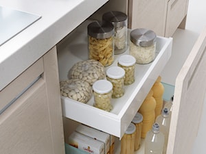 Funkcjonalne rozwiązania ukryte w szafkach kuchennych