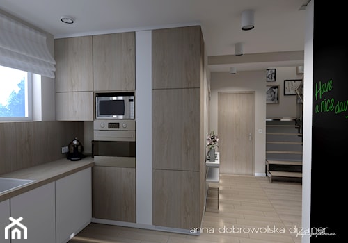 Wnętrze domu szeregowego - Otwarta z zabudowaną lodówką kuchnia z oknem, styl nowoczesny - zdjęcie od studio dizajner