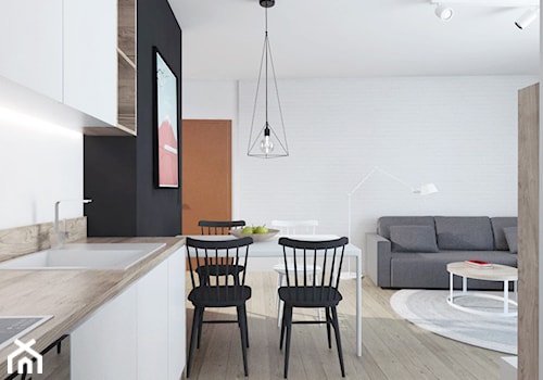 projekt 16 - Średnia biała czarna jadalnia w kuchni, styl skandynawski - zdjęcie od PASS architekci
