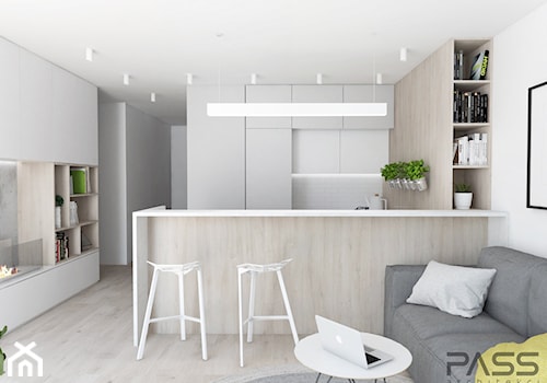 Projekt 19 - Mała otwarta z salonem biała z zabudowaną lodówką kuchnia w kształcie litery u, styl nowoczesny - zdjęcie od PASS architekci