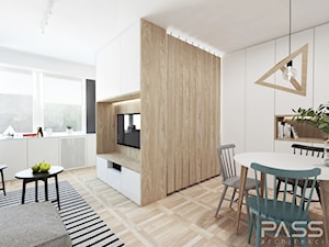 Projekt 28 - Średni biały salon z jadalnią, styl skandynawski - zdjęcie od PASS architekci