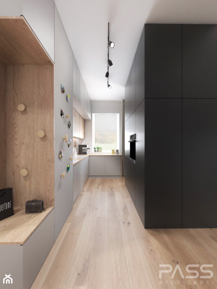 Projekt 30 - Mała otwarta z salonem biała z zabudowaną lodówką kuchnia jednorzędowa z oknem, styl skandynawski - zdjęcie od PASS architekci