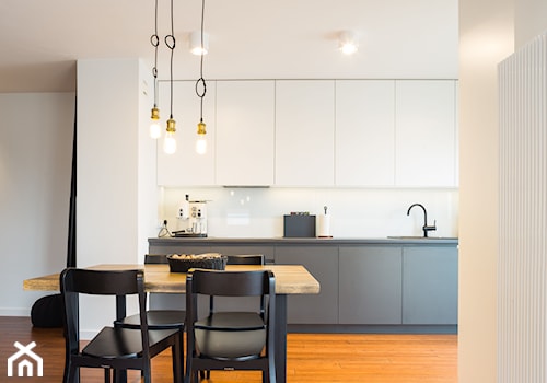 realizacja mieszkania w Luboniu - Średnia biała jadalnia w kuchni, styl minimalistyczny - zdjęcie od marina suchorska architektura wnętrz