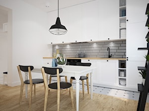Projekt mieszkania w Poznaniu - Średnia otwarta z salonem biała szara z zabudowaną lodówką z nablatowym zlewozmywakiem kuchnia jednorzędowa, styl skandynawski - zdjęcie od marina suchorska architektura wnętrz