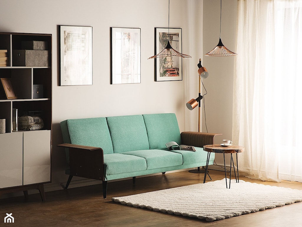 zielona sofa w stylu retro