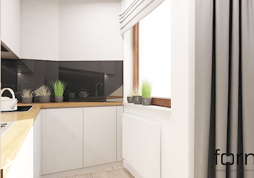 MIESZKANIE WROCŁAWSKA - Średnia zamknięta biała z zabudowaną lodówką z nablatowym zlewozmywakiem kuchnia w kształcie litery l z oknem, styl nowoczesny - zdjęcie od FORMA - Pracownia Architektury Wnętrz