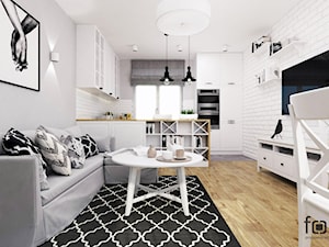 MIESZKANIE PACHOŃSKIEGO - Mały biały szary salon z kuchnią z jadalnią z bibiloteczką, styl skandynawski - zdjęcie od FORMA - Pracownia Architektury Wnętrz