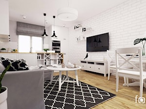 MIESZKANIE PACHOŃSKIEGO - Średni biały salon z kuchnią z jadalnią z bibiloteczką, styl skandynawski - zdjęcie od FORMA - Pracownia Architektury Wnętrz
