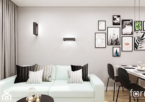 MIESZKANIE AVIA - Mały biały szary salon z jadalnią, styl nowoczesny - zdjęcie od FORMA - Pracownia Architektury Wnętrz