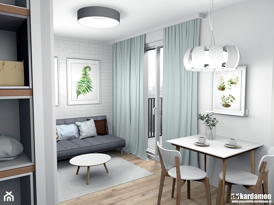 Zgrabne mieszkanie pod wynajem 27m2 - Mały biały salon z jadalnią z tarasem / balkonem, styl nowoczesny - zdjęcie od Pracownia Kardamon