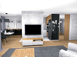 Ciepłe szarości w bloku ze ścianką TV - Średni biały czarny salon z kuchnią z jadalnią, styl nowoczesny - zdjęcie od Pracownia Kardamon
