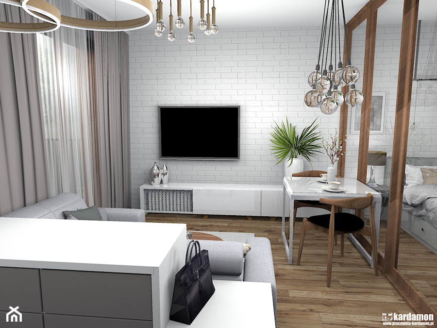 Elegancki salon z wydzieloną sypialnią 26m2 - Mały biały salon z jadalnią, styl nowoczesny - zdjęcie od Pracownia Kardamon