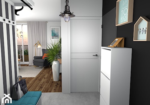 Kolorowe mieszkanie dla młodych z cegłą w kuchni - Mały z wieszakiem biały czarny hol / przedpokój - zdjęcie od Pracownia Kardamon
