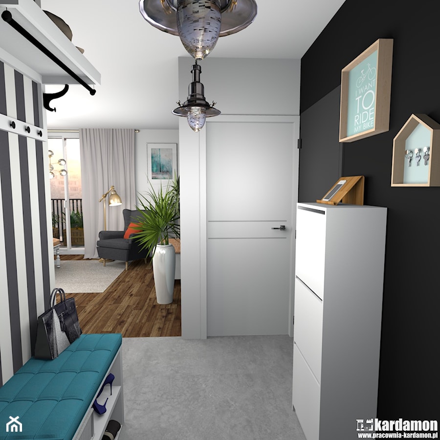 Kolorowe mieszkanie dla młodych z cegłą w kuchni - Mały z wieszakiem biały czarny hol / przedpokój - zdjęcie od Pracownia Kardamon