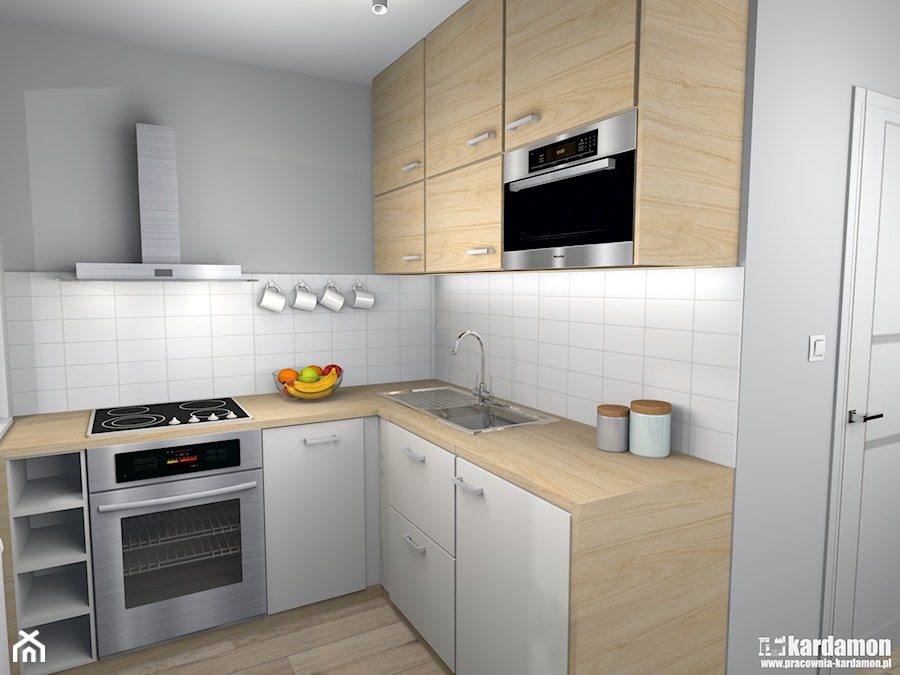 Zgrabne mieszkanie pod wynajem 27m2 - Mała otwarta biała szara z zabudowaną lodówką z nablatowym zlewozmywakiem kuchnia w kształcie litery l, styl minimalistyczny - zdjęcie od Pracownia Kardamon