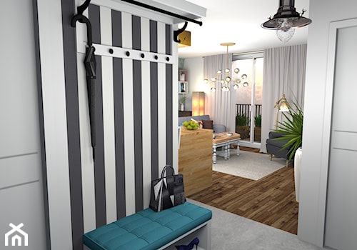 Kolorowe mieszkanie dla młodych z cegłą w kuchni - Średni z wieszakiem biały hol / przedpokój - zdjęcie od Pracownia Kardamon