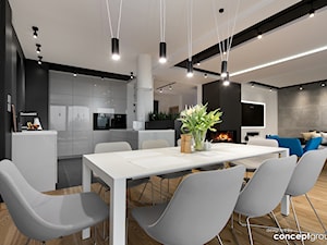 Dom w Dąbrowie Górniczej - Realizacja - Średnia otwarta biała czarna szara jadalnia w kuchni w salon ... - zdjęcie od Conceptgroup