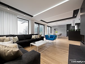 Dom w Dąbrowie Górniczej - Realizacja - Duży biały czarny szary salon z kuchnią z jadalnią, styl nowoczesny - zdjęcie od Conceptgroup
