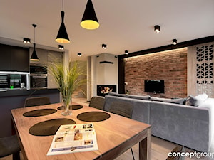 Dom w Rudzie Śląskiej - Realizacja - Średnia otwarta beżowa szara jadalnia w kuchni w salonie, styl ... - zdjęcie od Conceptgroup