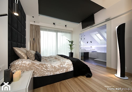 Duża biała sypialnia z łazienką z balkonem / tarasem, styl nowoczesny - zdjęcie od Conceptgroup