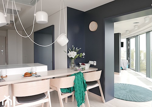 KONKURS - minimalistycznie i funkcjonalnie - Mała otwarta z salonem czarna szara kuchnia dwurzędowa, styl minimalistyczny - zdjęcie od Archomega Biuro Architektoniczne