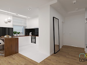 Mieszkanie 45m2 - Średnia otwarta biała czarna kuchnia w kształcie litery g z wyspą lub półwyspem, styl nowoczesny - zdjęcie od MONOTEKTURA