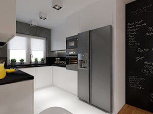 Projekt metamorfozy wnętrz wielopokoleniowego domu w Krynicy Zdrój - Średnia otwarta czarna z zabudowaną lodówką z lodówką wolnostojącą kuchnia w kształcie litery u, styl nowoczesny - zdjęcie od PRØJEKTYW | Architektura Wnętrz & Design