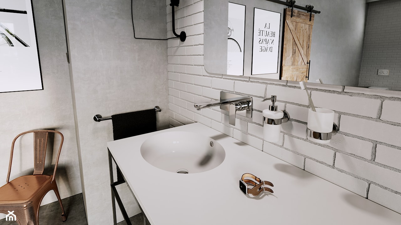 industrialna łazienka z białą cegłą na ścianie