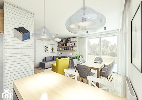 Mieszkanie w stylu skandynawskim pod Rzeszowem. - Średnia otwarta z salonem biała z zabudowaną lodówką z lodówką wolnostojącą kuchnia w kształcie litery g - zdjęcie od MEEKO Architekci