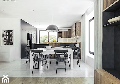 Dom w stylu nowoczesnym pod Mielcem - Średnia biała czarna jadalnia w salonie w kuchni, styl nowoczesny - zdjęcie od MEEKO Architekci