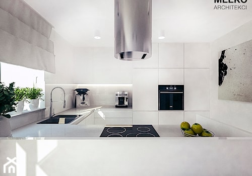 Dom w stylu minimalistycznym - Średnia otwarta z kamiennym blatem biała z zabudowaną lodówką z lodówką wolnostojącą z nablatowym zlewozmywakiem kuchnia w kształcie litery g z oknem, styl minimalistyczny - zdjęcie od MEEKO Architekci