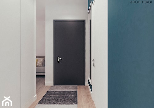 Mieszkanie w stylu skandynawskim w Warszawie - Mały biały niebieski hol / przedpokój, styl skandynawski - zdjęcie od MEEKO Architekci