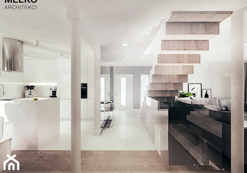 Dom w stylu minimalistycznym - Średnia otwarta z kamiennym blatem biała z zabudowaną lodówką z lodówką wolnostojącą z podblatowym zlewozmywakiem kuchnia w kształcie litery u, styl minimalistyczny - zdjęcie od MEEKO Architekci