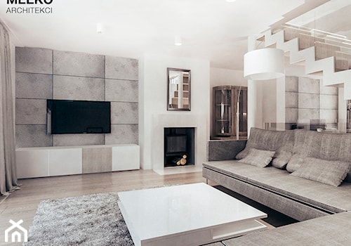 Dom w stylu minimalistycznym - Duży biały szary salon, styl minimalistyczny - zdjęcie od MEEKO Architekci