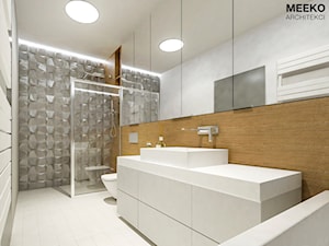 Mieszkanie w stylu nowoczesnym w Rzeszowie. - Średnia bez okna z lustrem łazienka, styl nowoczesny - zdjęcie od MEEKO Architekci