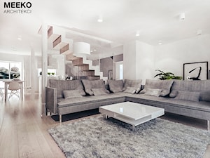 Dom w stylu minimalistycznym - Średni biały salon z jadalnią, styl minimalistyczny - zdjęcie od MEEKO Architekci