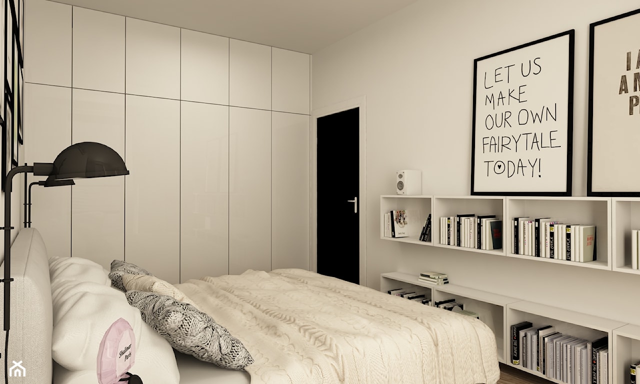 biała sypialnia, biała szafa, czarna lampa metalowa, czarne drzwi, czarno-białe grafiki na ścianie
