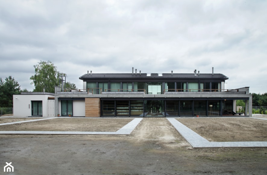 Dom Jednorodzinny pod Poznaniem - Duże jednopiętrowe nowoczesne domy jednorodzinne murowane z dwuspadowym dachem - zdjęcie od Architekt Krzysztof Żółtowski - PEGAZ