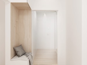 Ciepłe mieszkanie - Średni z wieszakiem biały hol / przedpokój, styl skandynawski - zdjęcie od FOORMA Pracownia Architektury Wnętrz