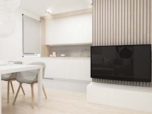 Ciepłe mieszkanie - Średnia biała jadalnia w salonie, styl skandynawski - zdjęcie od FOORMA Pracownia Architektury Wnętrz