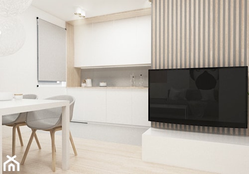 Ciepłe mieszkanie - Średnia biała jadalnia w salonie, styl skandynawski - zdjęcie od FOORMA Pracownia Architektury Wnętrz