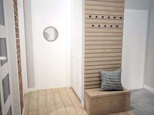 Projekt mieszkania w Warszawie - Średni z wieszakiem biały brązowy szary hol / przedpokój, styl skandynawski - zdjęcie od Mart-Design Architektura Wnętrz