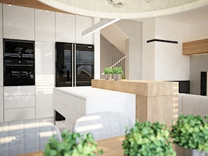 Projekt domu Warszawa Pruszków - Duża otwarta z kamiennym blatem biała z zabudowaną lodówką kuchnia jednorzędowa z wyspą lub półwyspem, styl nowoczesny - zdjęcie od Mart-Design Architektura Wnętrz