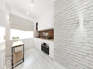 Mieszkanie w stylu skandynawskim osiedle Avia - Średnia zamknięta biała z zabudowaną lodówką z nablatowym zlewozmywakiem kuchnia w kształcie litery l z oknem, styl skandynawski - zdjęcie od Good Place For Living