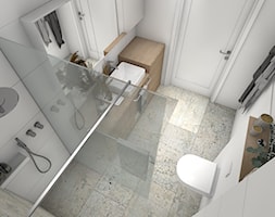 Niewielka łazienka z prysznicem w mieszkaniu. - zdjęcie od CARREA - Homebook