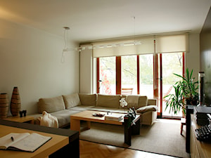 Wnętrza apartamentu w Krakowie - Średni biały salon z kuchnią z tarasem / balkonem, styl nowoczesny - zdjęcie od KJ Architekci