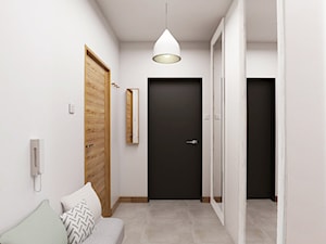 Mieszkanie, ul.Bajeczna - Średni z wieszakiem biały hol / przedpokój, styl nowoczesny - zdjęcie od FUTURUM ARCHITECTURE